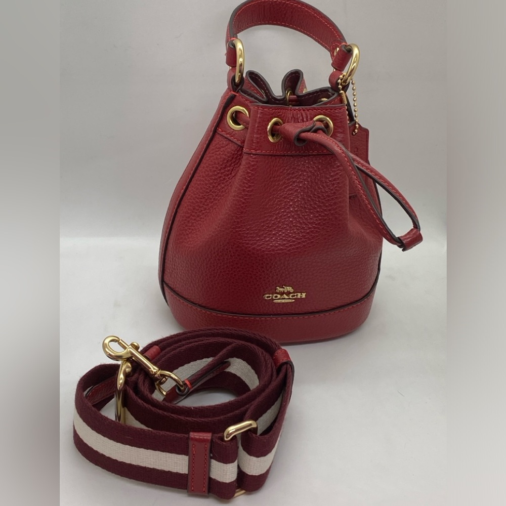 Red coach bucket bag with strap